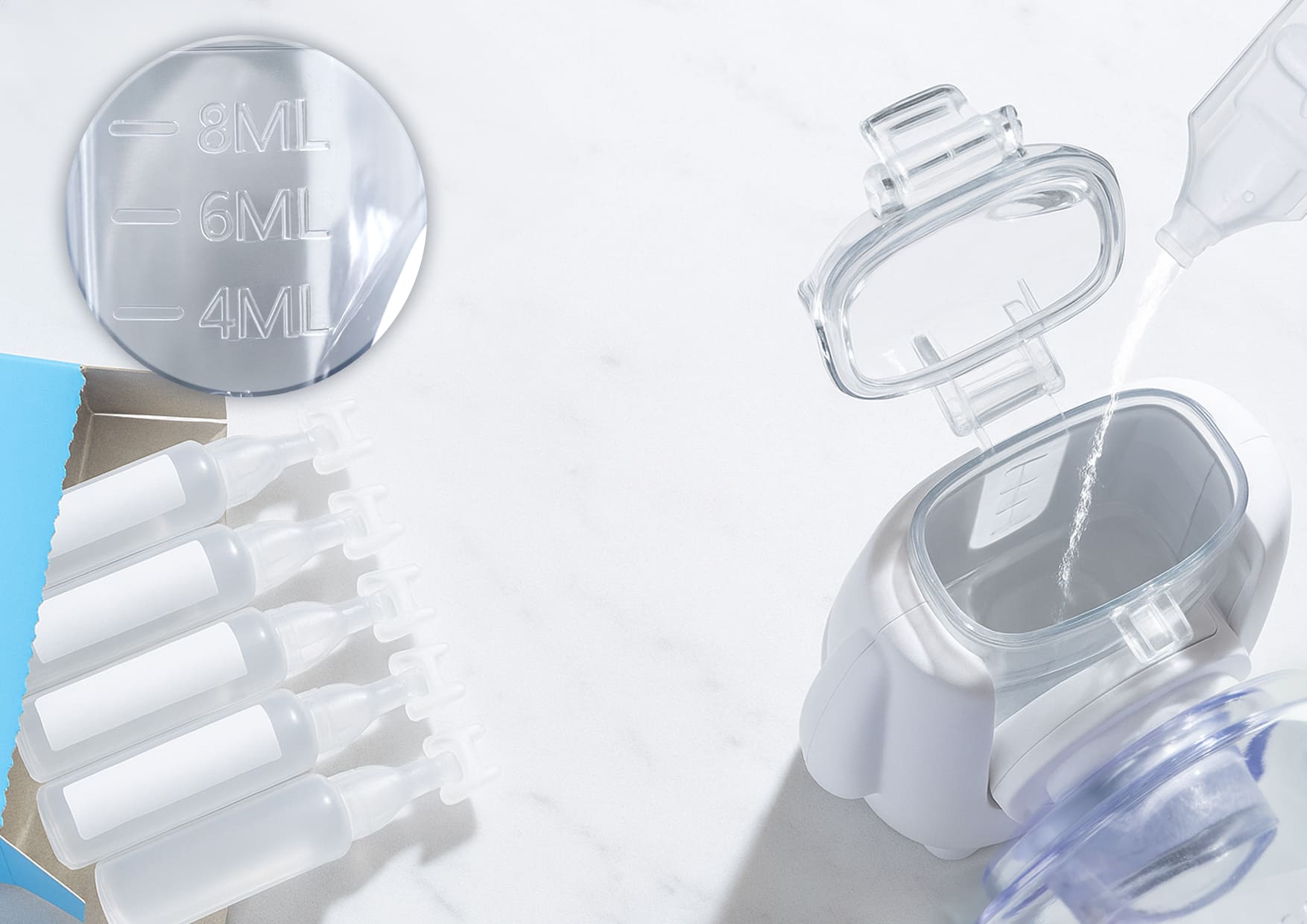 Nebulizator Neno Atemo z otwartym zbiornikiem i miarką do płynów inhalacyjnych.