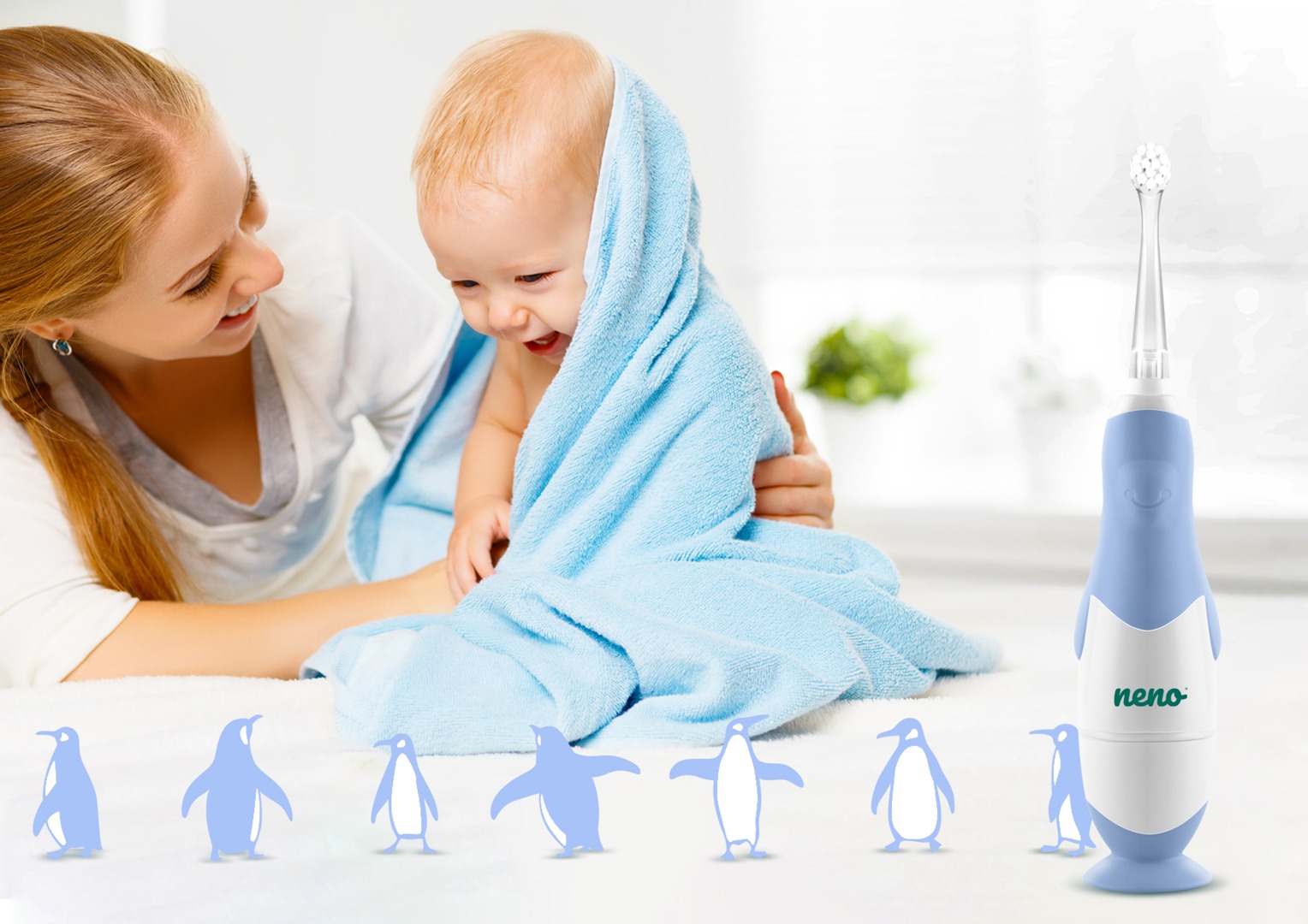 woman wiping her child with a towel and Neno Denti in the background