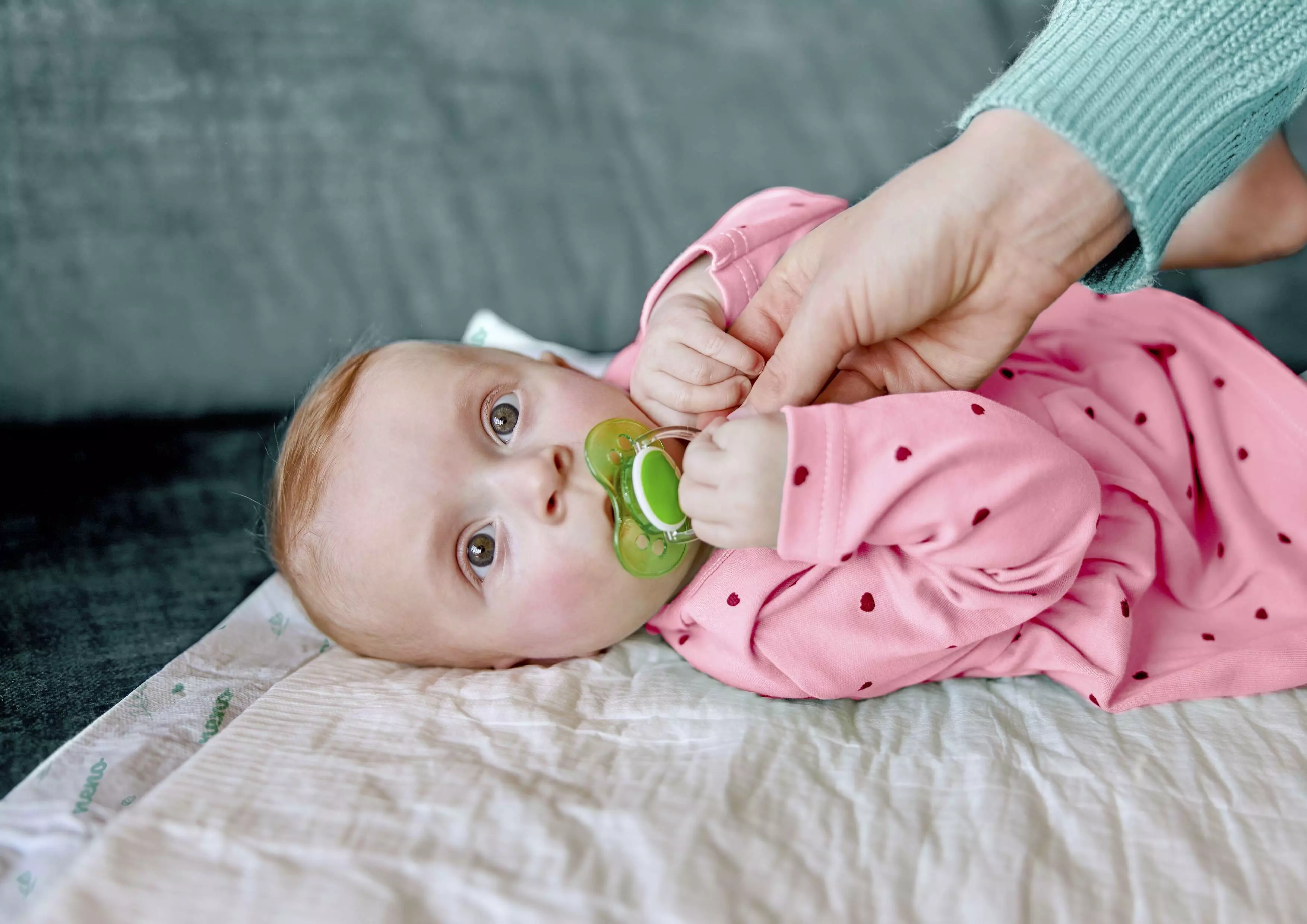 lying infant on the Neno Neo underlay