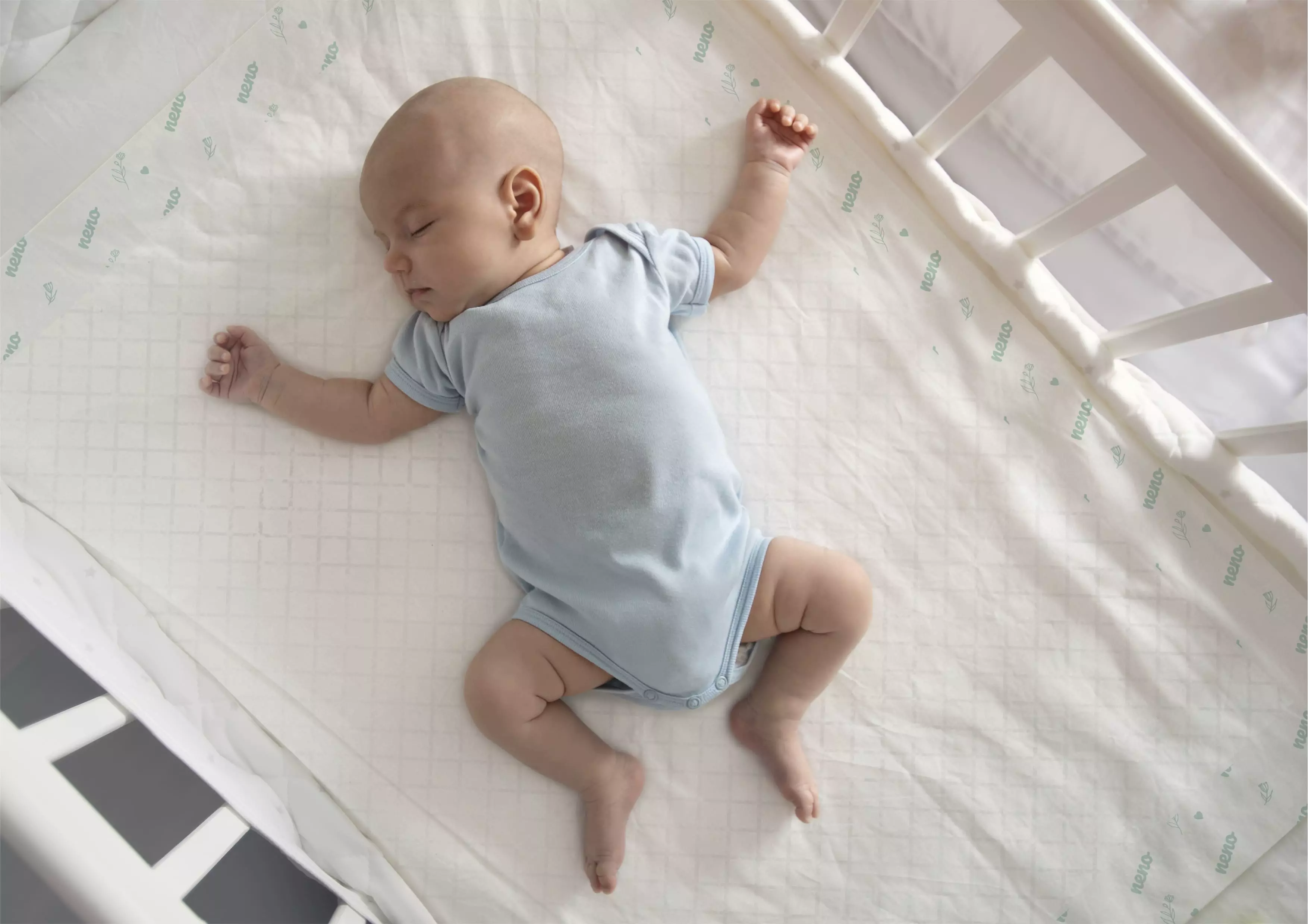 baby sleeping in a crib